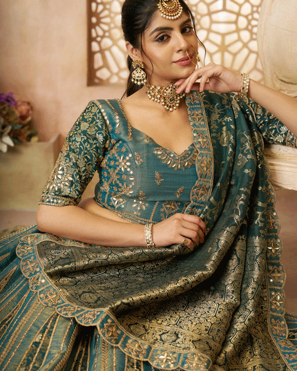 Glamorous Green Tissue Silk Wedding Wear Lehenga Choli