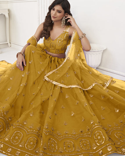 Mustard Net Embroidered Lehenga Choli