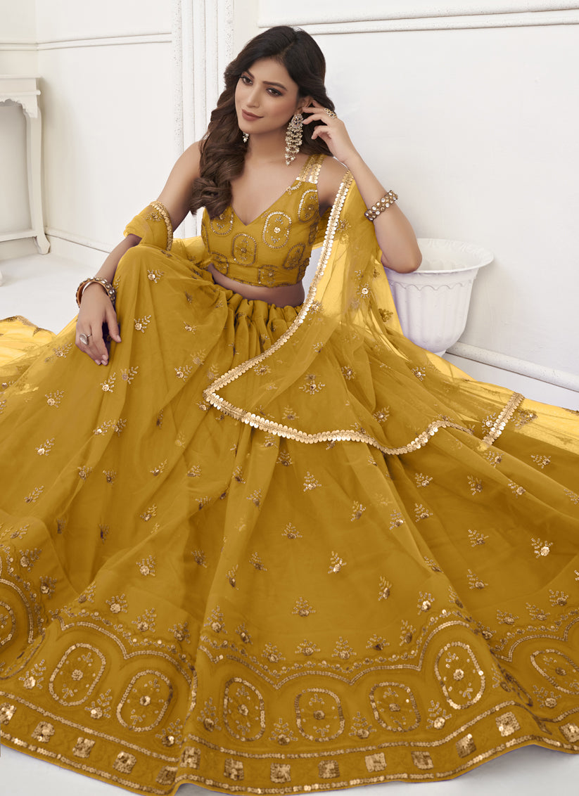 Mustard Net Embroidered Lehenga Choli