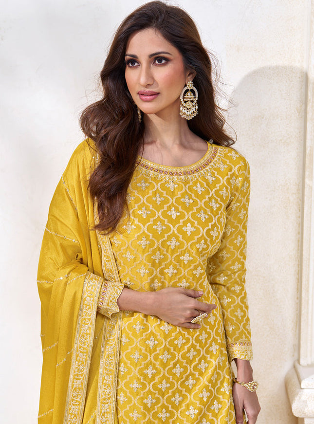 Mustard Chinnon Embroidered Lehenga Kameez