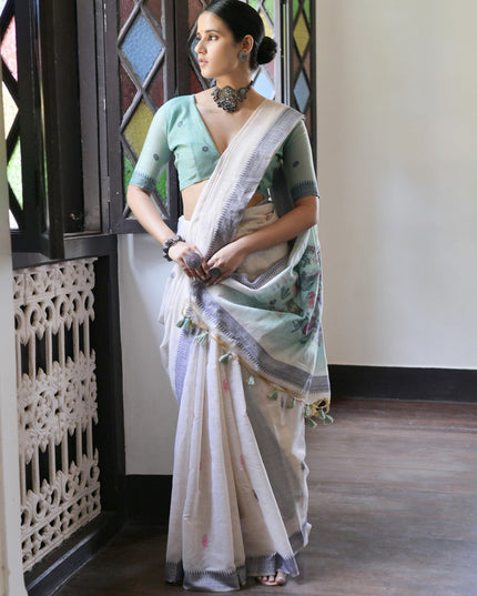 Ivory Cotton Ikkat Woven Saree For Festival