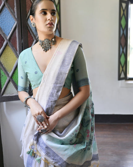 Ivory Cotton Ikkat Woven Saree For Festival