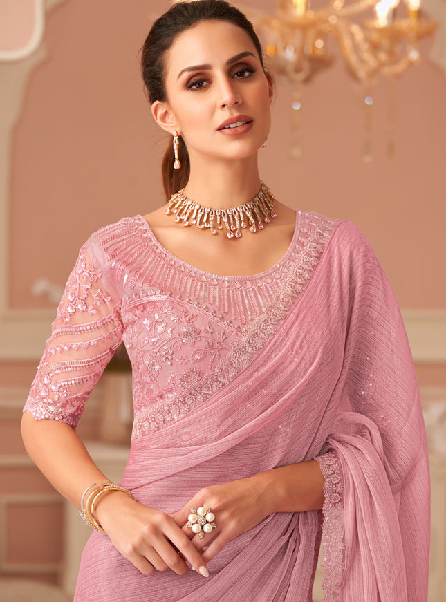 Mesmerizing Coral Pink Embroidered Georgette Party Wear Saree