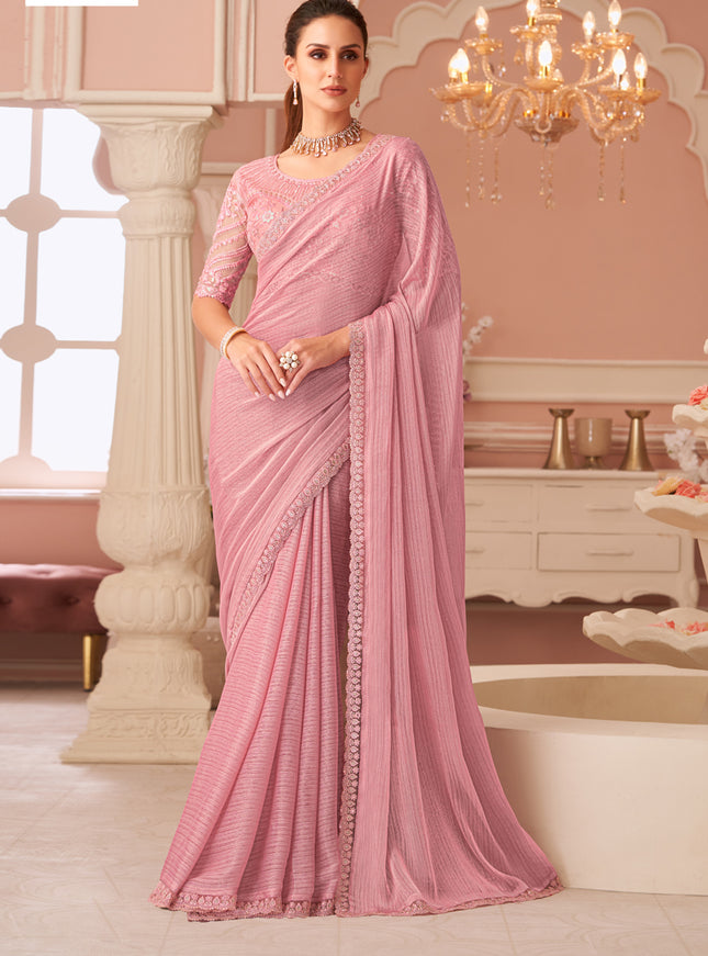 Mesmerizing Coral Pink Embroidered Georgette Party Wear Saree