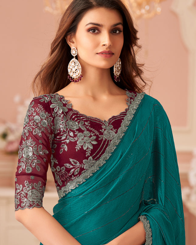 Ravishing Rama Green Embroidered Satin Party Wear Saree