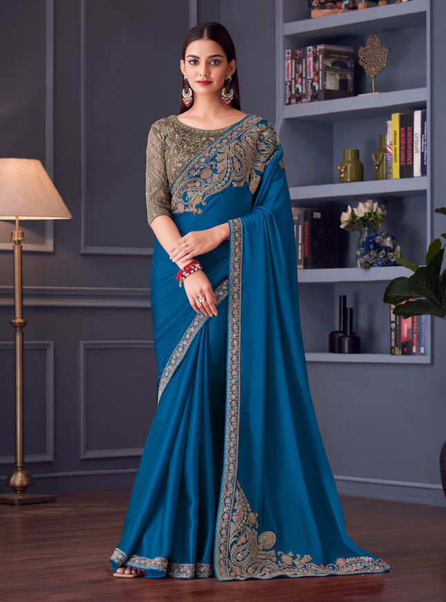 Sleek Peacock Blue Satin Silk Embroidered Designer Wedding Saree